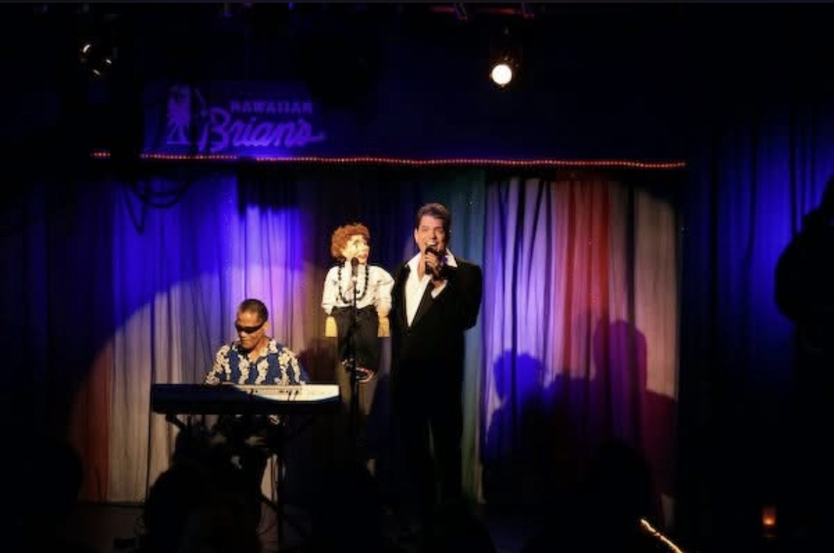Junior Kekuewa Jr. performing live with Wayne Borje and a ventriloquist figure